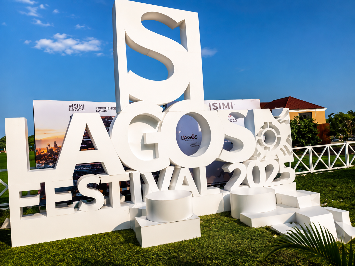 White sculptural Isimi Lagos Festival 2025 lettering and geometric forms outdoors